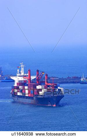 Stock Photo - Container ship at sea. Fotosearch