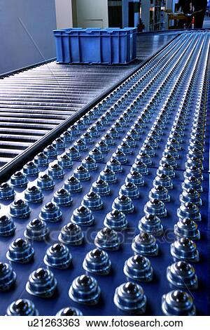 Plastic box on conveyor belt View Large Photo Image Stock Image - Plastic box on conveyor belt. Fotosearch