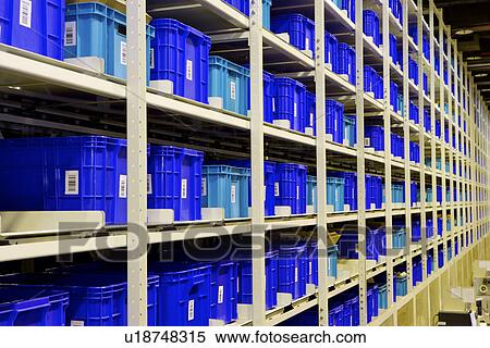 Plastic boxes on shelf View Large Photo Image Stock Photography - Plastic boxes on shelf. Fotosearch