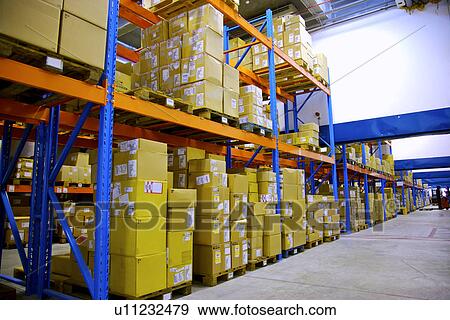 Stock Photo - Warehouse shelves stacked with boxes. Fotosearch