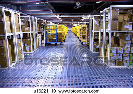 Warehouse shelves stacked with boxes View Large Photo Image Stock Photo - Warehouse shelves stacked with boxes. Fotosearch