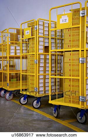 Warehouse with stacks of cardboard boxes View Large Photo Image Stock Photo - Warehouse with stacks of cardboard boxes. Fotosearch