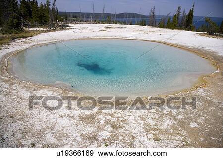 Stock Photo - Blue Funnel Spring, West Thumb Geyser Basin, Yellowstone National Park, Wyoming, USA. Fotosearch