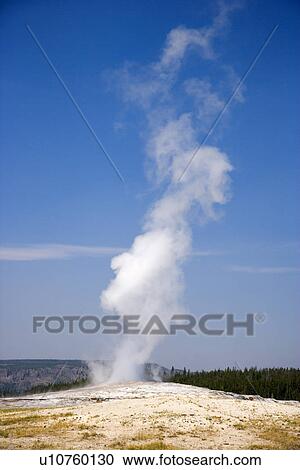 Stock Image - USA, Wyoming, Yellowstone National Park, Old Faithful. Fotosearch