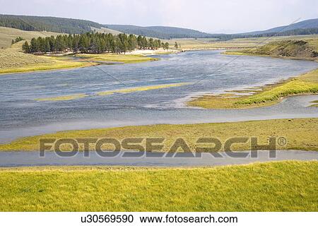 Stock Image - Yellowstone River meandering through Hayden Valley, Yellowstone National Park, United States of America. Fotosearch