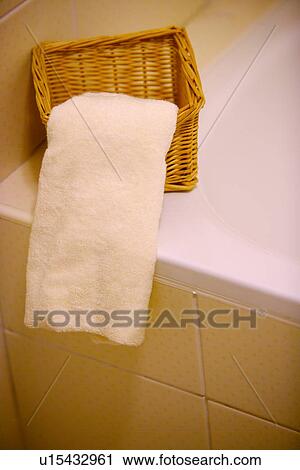 Bathtub with basket and towel View Large Photo Image Stock Image - Bathtub with basket and towel. Fotosearch