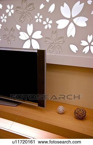 Flat screen on side cabinet View Large Photo Image Stock Image - Flat screen on side cabinet. Fotosearch