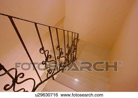 Stock Photograph - Handrail in staircase. Fotosearch