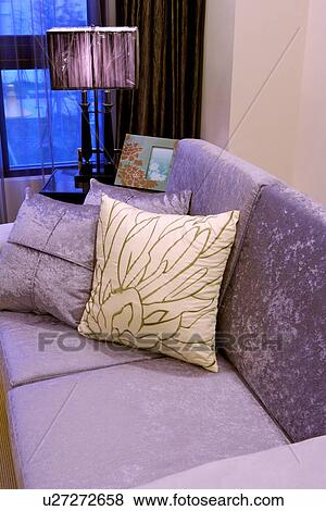 Stock Photo - Home interior with sofa and lamp. Fotosearch