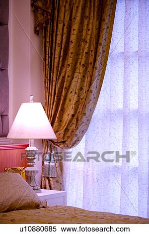 Stock Photography - Lamp by bed. Fotosearch