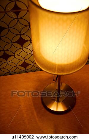 Stock Image - Lamp on table. Fotosearch