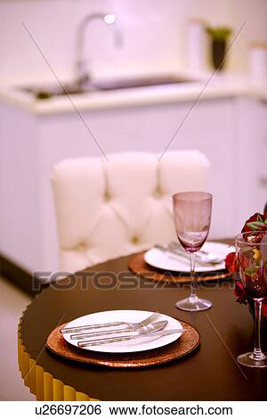 Stock Photograph - Modern kitchen with dinning table. Fotosearch
