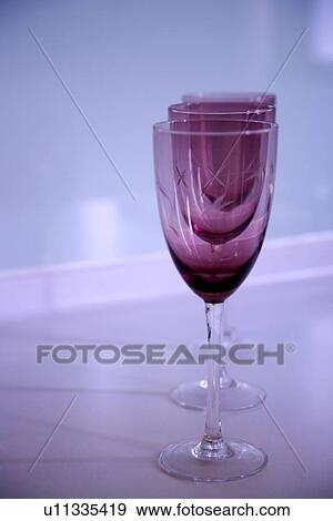 Stock Photo - Three wineglasses, close up. Fotosearch