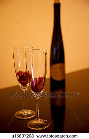 Stock Photo - Wine bottle and wineglasses. Fotosearch
