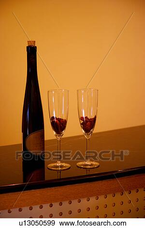 Stock Photo - Wineglasses and winebottle. Fotosearch
