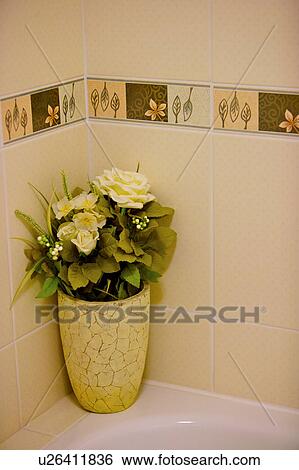 Stock Photograph - Flower arrangement at corner. Fotosearch