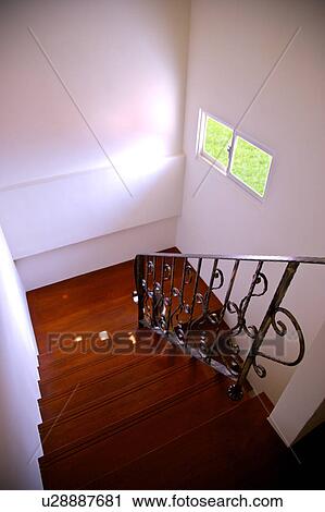 Handrails in stairwell, elevated view View Large Photo Image Stock Image - Handrails in stairwell, elevated view. Fotosearch