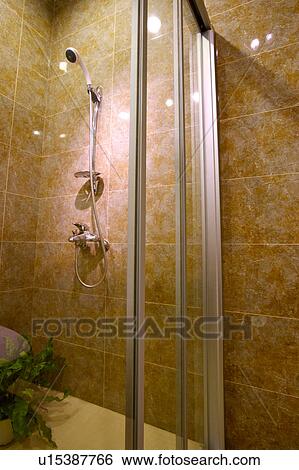 Stock Photograph - Shower head in bathroom. Fotosearch