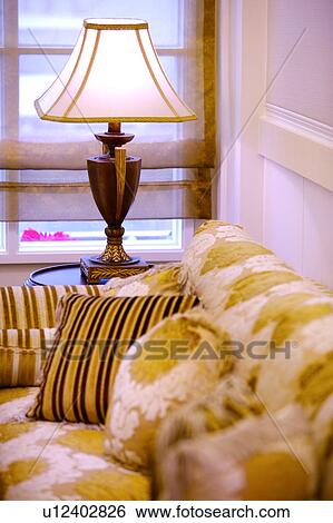 Stock Photograph - Sofa and lamp. Fotosearch