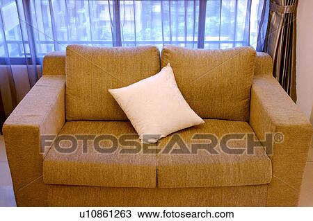 Stock Image - Sofa near window. Fotosearch