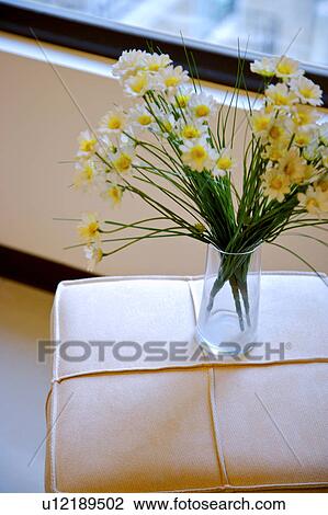 Vase with flowers on chair View Large Photo Image Stock Image - Vase with flowers on chair. Fotosearch