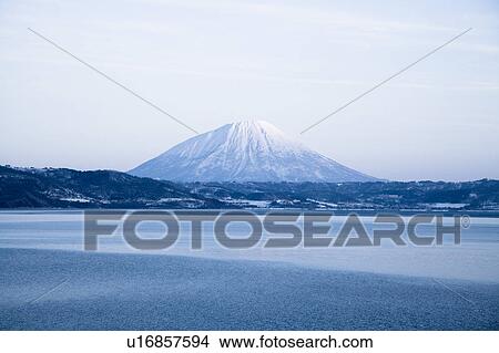 Japan, Hokkaido, Lake Toya-ko, snow-covered mountain View Large Photo Image Picture - Japan, Hokkaido, Lake Toya-ko, snow-covered mountain. Fotosearch