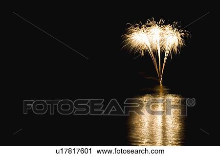 Stock Image - Japan, Hokkaido, Lake Toya-ko, Fireworks display. Fotosearch