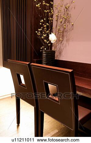 Chairs and Flower Arrangement in restaurant View Large Photo Image Stock Image - Chairs and Flower Arrangement in restaurant. Fotosearch