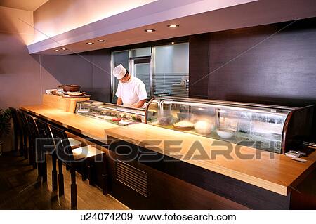 Stock Photo - Chef working in restaurant. Fotosearch