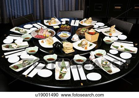 Stock Image - Leftovers on table. Fotosearch