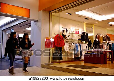 People strolling through shopping mall View Large Photo Image Stock Image - People strolling through shopping mall. Fotosearch