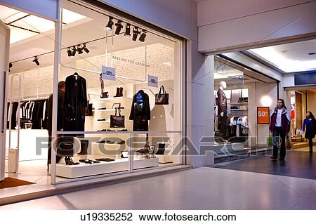 People walking past shopping mall View Large Photo Image Stock Image - People walking past shopping mall. Fotosearch