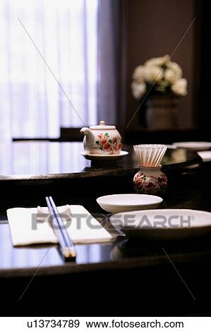 Stock Photo - Place setting in restaurant, close-up. Fotosearch