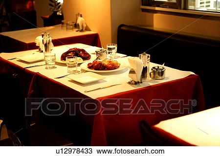 Stock Image - Place setting in restaurant. Fotosearch