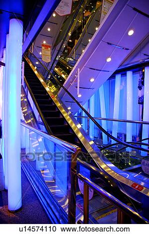 Stock Image - Shopping mall escalators. Fotosearch
