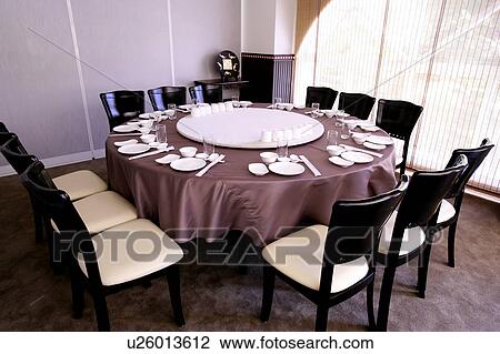 Stock Image - Table setting in restaurant, close-up. Fotosearch