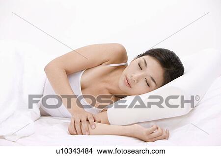Picture - "Young woman sleeping, portrait". Fotosearch