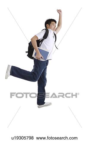 "Teenager boy running with hands raised, portrait" View Large Photo Image Stock Photo - "Teenager boy running with hands raised, portrait". Fotosearch