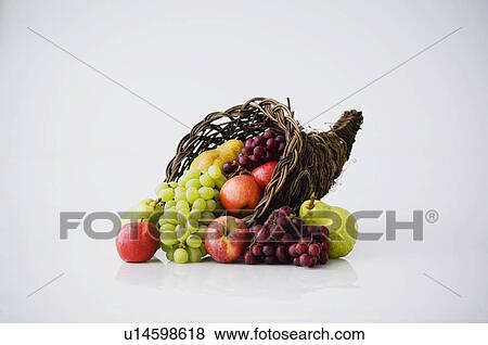 Stock Photo - Cornucopia of fruit. Fotosearch