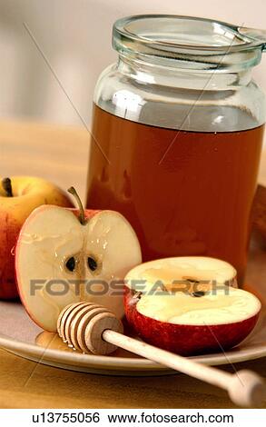 Honey and apples View Large Photo Image Stock Photograph - Honey and apples. Fotosearch
