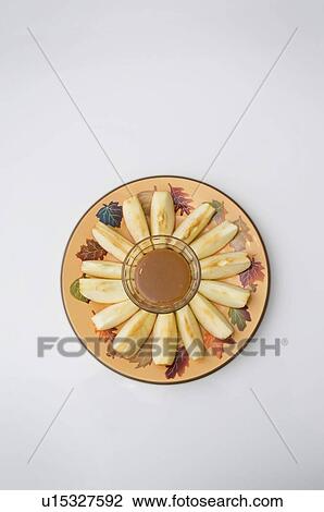 Plate of apples with caramel dip View Large Photo Image Stock Image - Plate of apples with caramel dip. Fotosearch