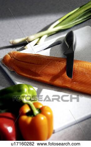 Salmon being prepared View Large Photo Image Stock Image - Salmon being prepared. Fotosearch