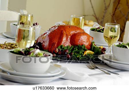 Stock Image - Turkey dinner table setup. Fotosearch