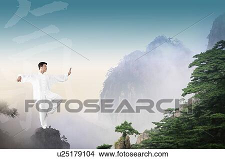 Stock Illustration - Man standing on one leg on a rock pinnacle, with a background of trees and mountains. Fotosearch