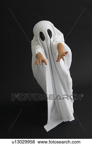 Child in ghost costume View Large Photo Image Stock Photo - Child in ghost costume. Fotosearch