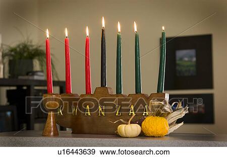 Kwanzaa candelabra and cup View Large Photo Image Stock Photo - Kwanzaa candelabra and cup. Fotosearch