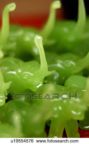 Stock Photograph - Green elephant decoration. Fotosearch