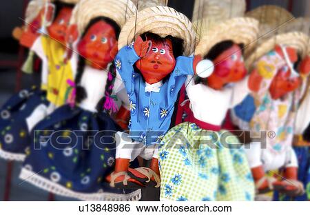 Stock Photograph - Handmade dolls at market. Fotosearch