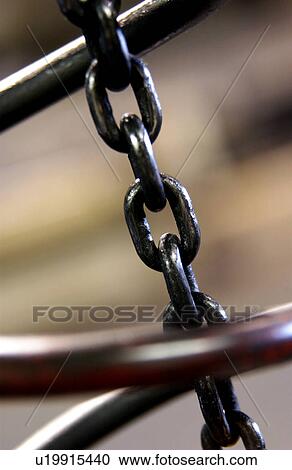 Stock Image - Detail of chain in factory. Fotosearch