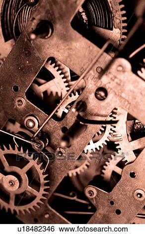 Gears of a clock View Large Photo Image Stock Photograph - Gears of a clock. Fotosearch